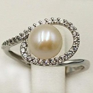 Ring with Pearl and Zircons