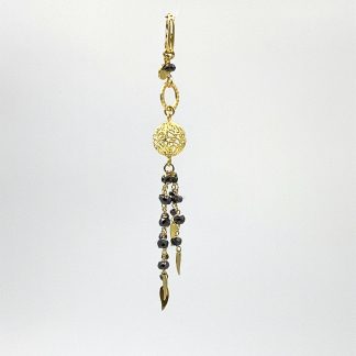 Yellow gold and black spinel pendant